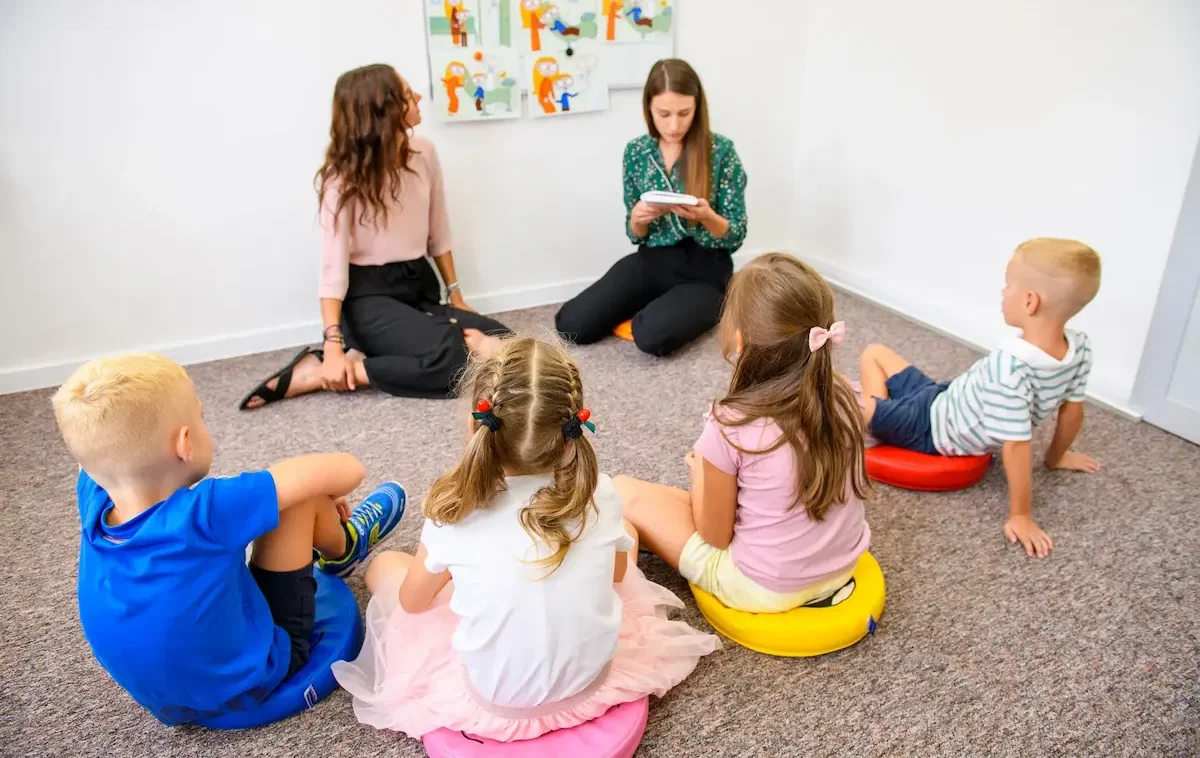 Students sitting in a circle for a group session