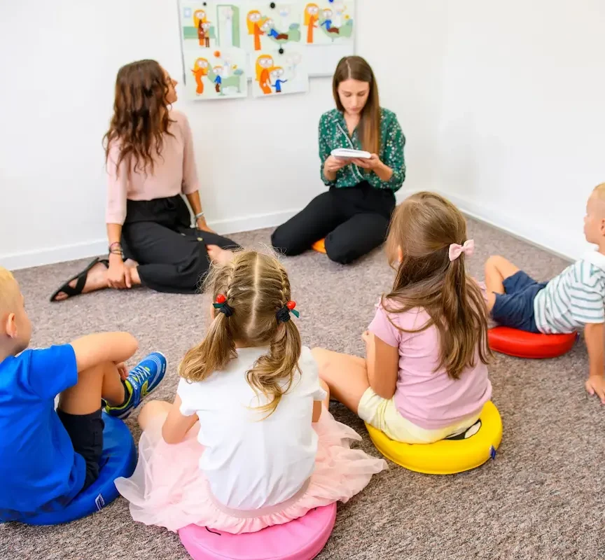 Students sitting in a circle for a group session