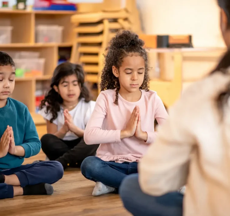Students practicing a calm breathing exercise