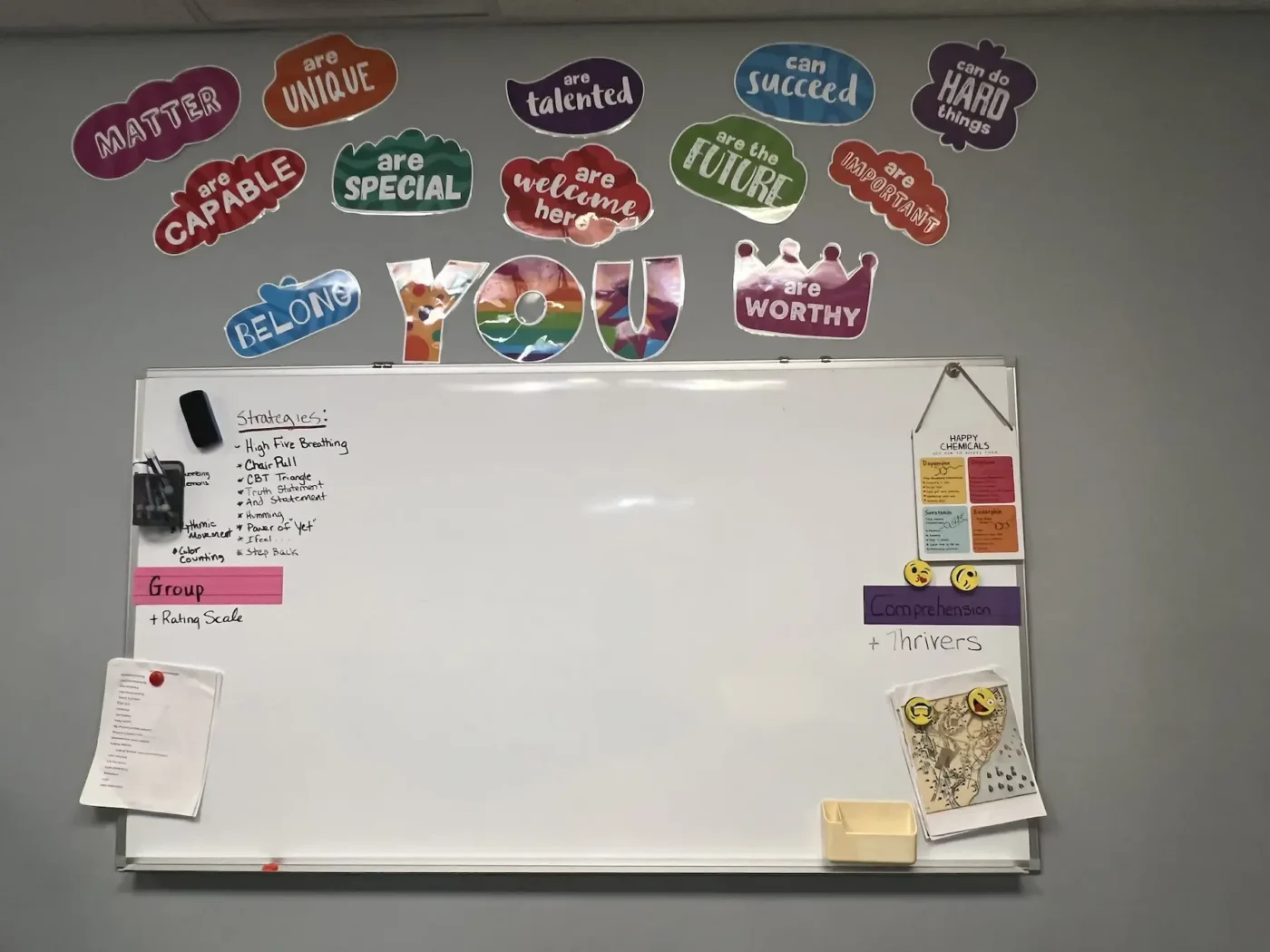 A classroom wall of encouraging words at the academy